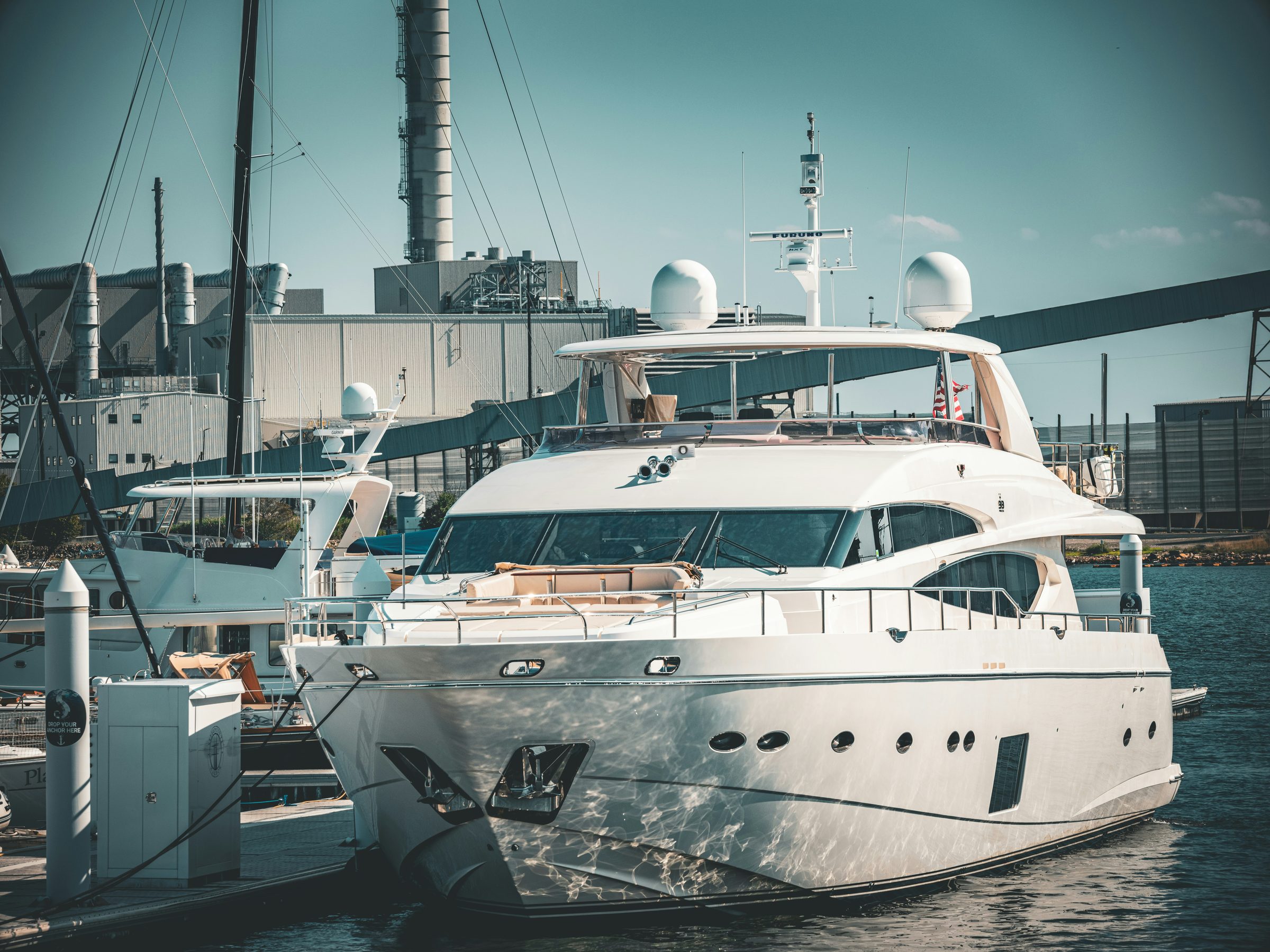 Classic motor yacht moored in a Mediterranean marina